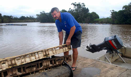 Urunga oyster grower John Lindsay was glad to find his oyster leases stood up to the floodwaters. Urunga oyster grower John Lindsay was glad to find his oyster leases stood up to the floodwaters.
